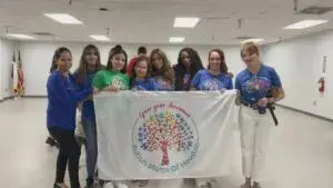 autismo en Houston con familias participando en evento inclusivo y actividades sensoriales para niños neurodivergentes